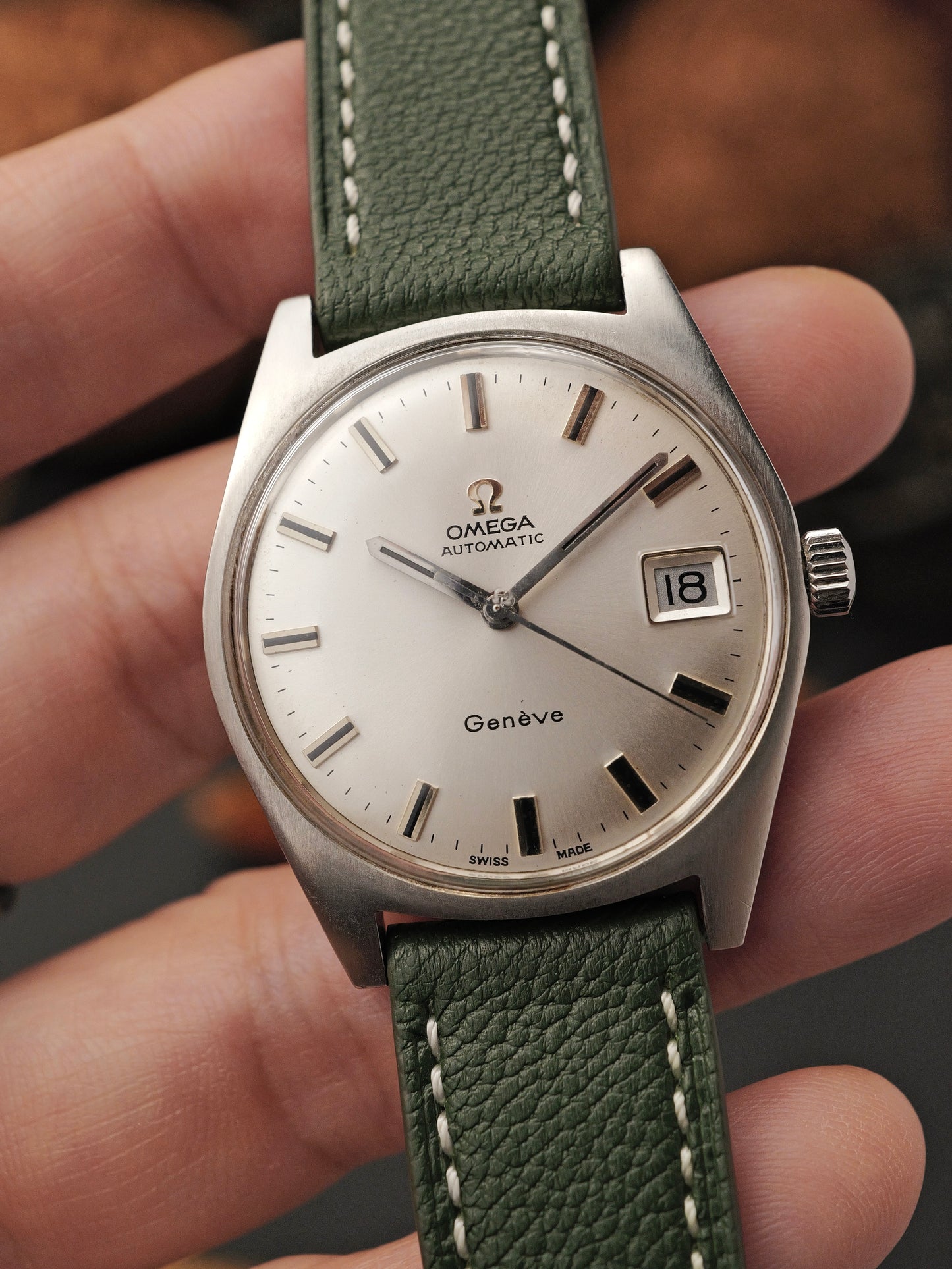 Omega Genève Silver Sunburst Dial Automatic Date Ref. 166.041 (circa 1969)