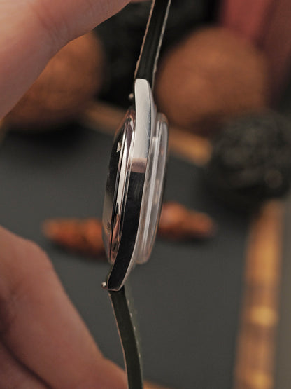 Omega Genève Silver Sunburst Dial Automatic Date Ref. 166.041 (circa 1969)