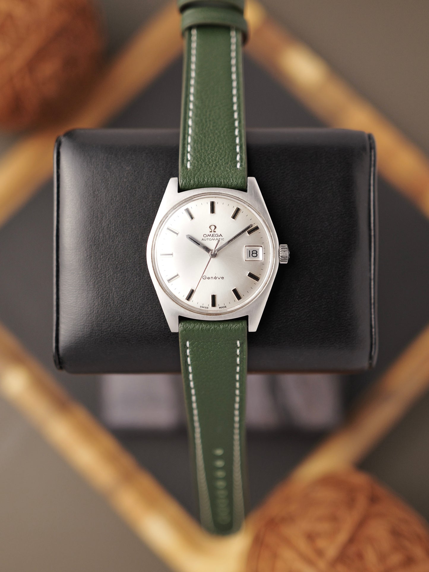 Omega Genève Silver Sunburst Dial Automatic Date Ref. 166.041 (circa 1969)