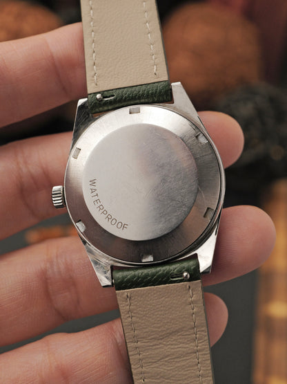 Omega Genève Silver Sunburst Dial Automatic Date Ref. 166.041 (circa 1969)