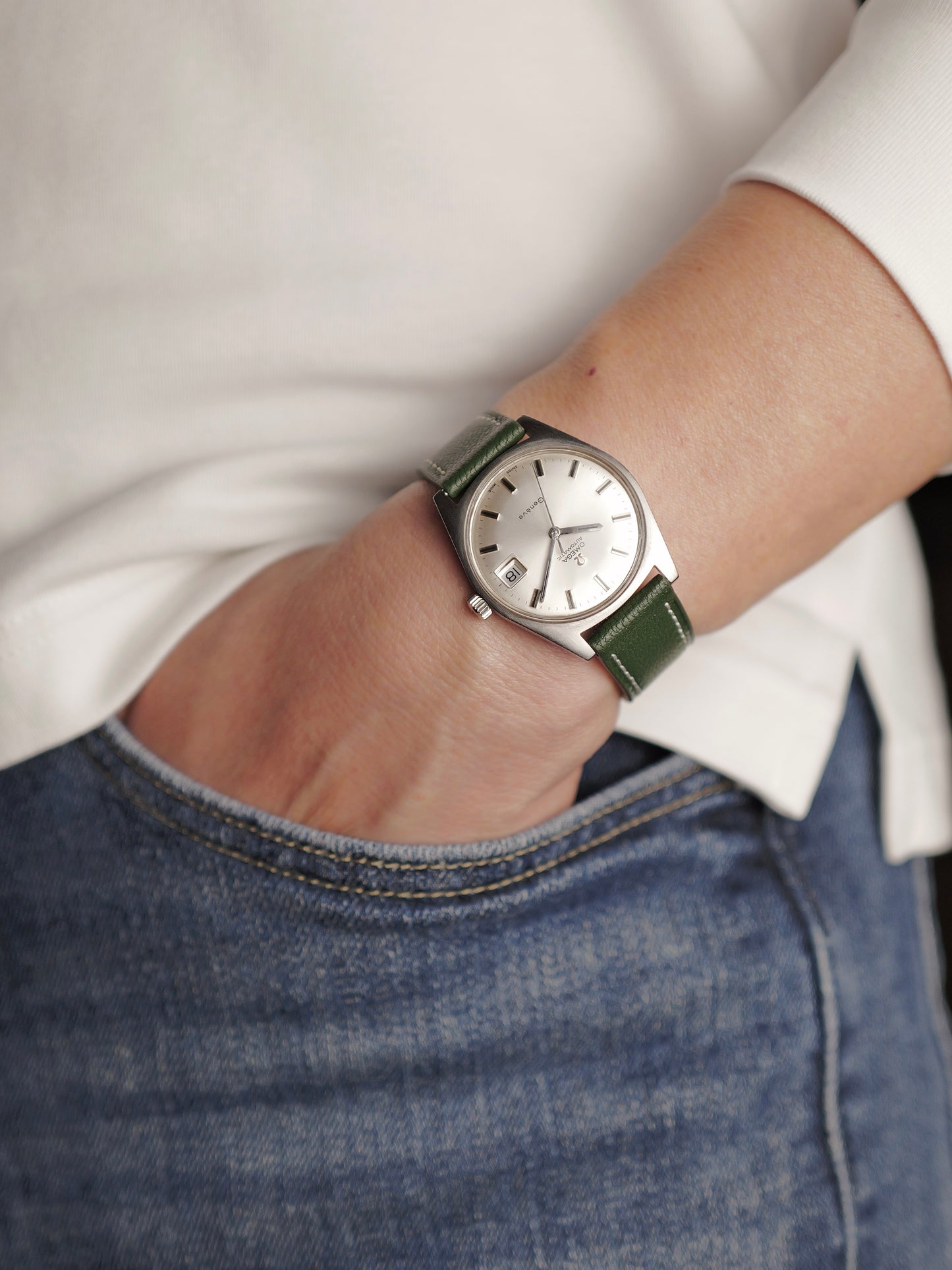 Omega Genève Silver Sunburst Dial Automatic Date Ref. 166.041 (circa 1969)